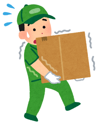 引っ越しの準備で段ボールに荷物を詰める様子