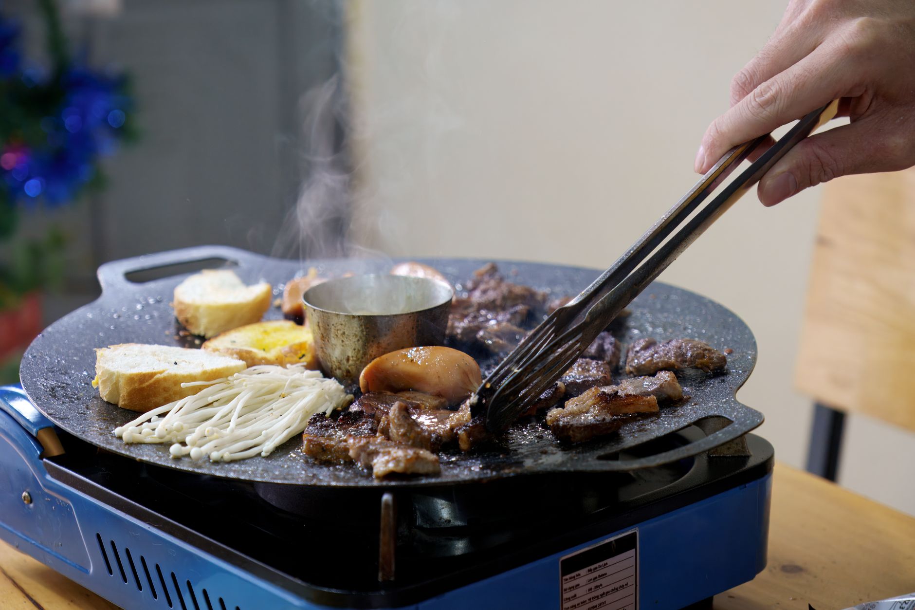vietnamese style tabletop bbq in action