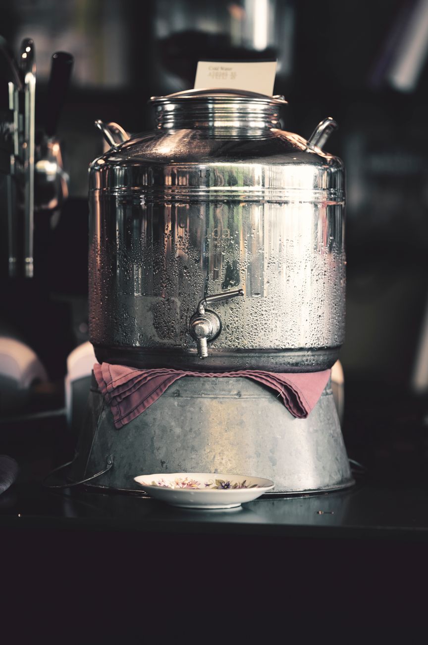 stainless steel hot water dispenser on stand